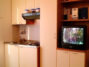 Kuhinja oz. manjša kuhinja v nastanitvi Apartment Carioca by Interhome