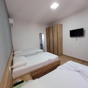 Postel nebo postele na pokoji v ubytování Hotel Erandi
