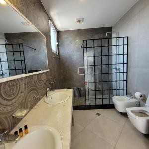 Koupelna v ubytování Hotel Erandi