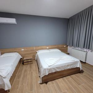 Postel nebo postele na pokoji v ubytování Hotel Erandi