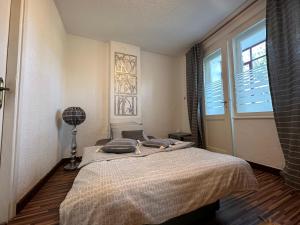 Postelja oz. postelje v sobi nastanitve Centar Apartman