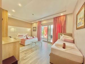 Katil atau katil-katil dalam bilik di Hotel Butua Residence
