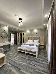 Postel nebo postele na pokoji v ubytování Luxmani Hotel & Spa