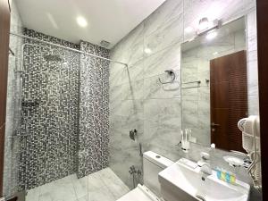 Koupelna v ubytování Luxmani Hotel & Spa