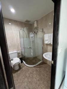 Ένα μπάνιο στο Tongyang House Serviced Apartment