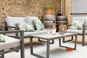 Posezení v ubytování Maison Dix Chambres d'hôtes et Espace SPA Bien être