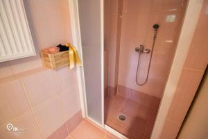 Koupelna v ubytování Odysseus Cozy Home + 26 fotografií