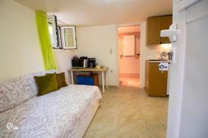 Kuchyň nebo kuchyňský kout v ubytování Odysseus Cozy Home