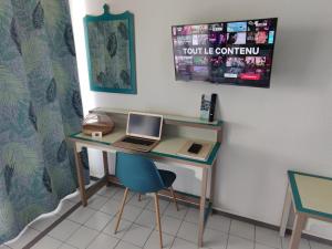 TV o dispositivi per l'intrattenimento presso Un petit joyau