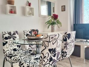 TV a/nebo společenská místnost v ubytování Paradise View Apartment