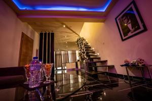 a room with a staircase with a glass floor at Le Loft Nancy in Nancy