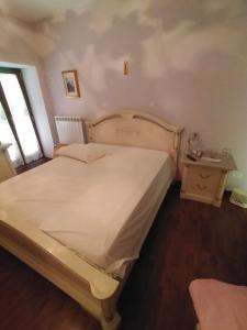 Katil atau katil-katil dalam bilik di Affittacamere tra Rieti e Terminillo