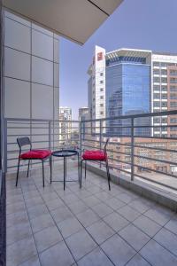 Icon Delux Hotel Apartments Al Barsha - Formerly Abidos的阳台或露台