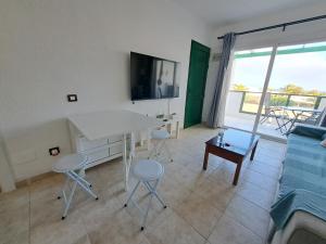 Televízia a/alebo spoločenská miestnosť v ubytovaní Jesnery Home