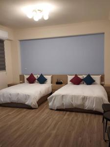 Letto o letti in una camera di Miss Travel Homestay