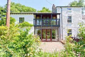 Jardin de l'établissement Sawmill Cottage, Coniston Water