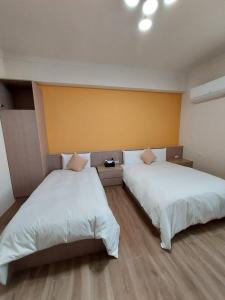 Letto o letti in una camera di Miss Travel Homestay