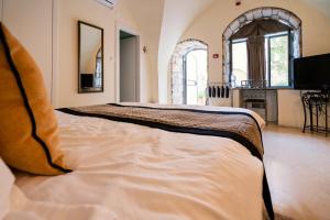 Letto o letti in una camera di Artists' Colony Inn Zefat