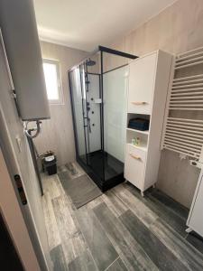 Koupelna v ubytování Appartement - location saisonnière