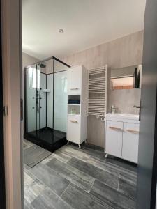 Koupelna v ubytování Appartement - location saisonnière