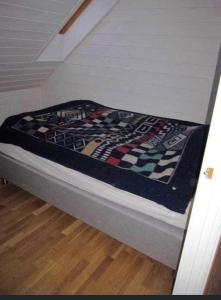 Ένα ή περισσότερα κρεβάτια σε δωμάτιο στο Skålafjæro 25