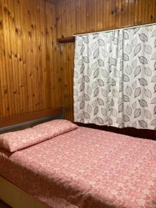 Posteľ alebo postele v izbe v ubytovaní Merkezde Sessiz ve Bahçeli Ev