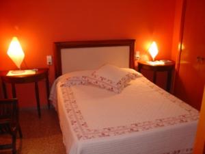 Ένα ή περισσότερα κρεβάτια σε δωμάτιο στο Hostal Restaurante Arasa