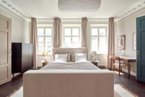 Postel nebo postele na pokoji v ubytování Large 4 bedroom with Balcony & Bathtub in CPH City