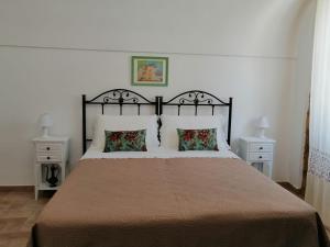 Posteľ alebo postele v izbe v ubytovaní Le Stanze dell'Emiro