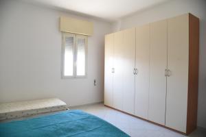 Postel nebo postele na pokoji v ubytování Casa Maria Sofia