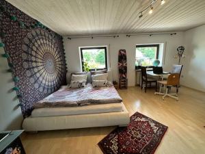 Postel nebo postele na pokoji v ubytování Urlaubstraum am Brombachsee- 5 stilvolle Zimmer-