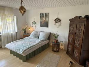 Postel nebo postele na pokoji v ubytování Urlaubstraum am Brombachsee- 5 stilvolle Zimmer-