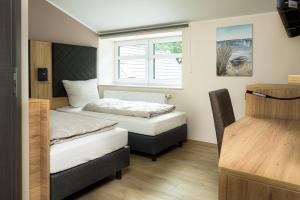 Letto o letti in una camera di Hotel Preyt -Self Check In-