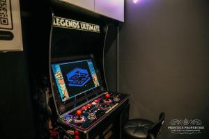 a video game machine in a room at Princes st by Prestige Properties SA in Ulverston