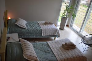 Un ou plusieurs lits dans un hébergement de l'établissement Camino a la Patagonia