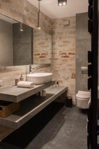 ムシナにあるWilla Rusticaのバスルーム(洗面台、トイレ付)