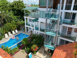 Bazén v ubytování Hotel Neptuno Refugio nebo v jeho okolí