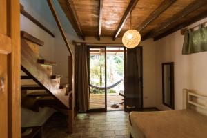 Кровать или кровати в номере Ohana Villas