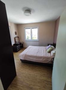 Ένα ή περισσότερα κρεβάτια σε δωμάτιο στο Cozy Apartment Palazzo