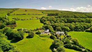 an aerial view of a house in a green field at Finest Retreats - Skyview Lodge in Eglwys-Fâch