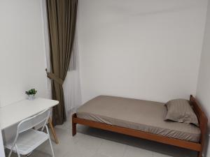En eller flere senger på et rom på The Netizen #Cheras#C180#MRT#9person stay#Staycation 3 Bed Rooms