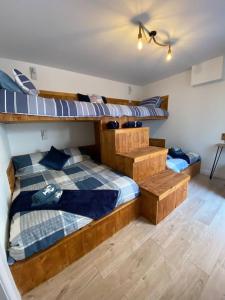 two bunk beds in a room with at The Old Warehouse in Blackpool