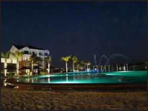 a swimming pool with a fountain at night at Vacation at the Blyde Riverwalk Estate in Pretoria +27 photos