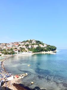 a view of a beach with people and the ocean at Sea La Vie - Terrazza sul mare in Agropoli