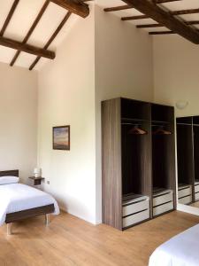 Postel nebo postele na pokoji v ubytování Agriturismo Tra Le Colline