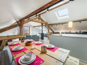 a kitchen and living room with a table and chairs at Chalet Saint-Martin-de-Belleville, 6 pièces, 12 personnes - FR-1-570-30 in Praranger