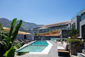 Bazén v ubytování Isla Villas & Suites nebo v jeho okolí