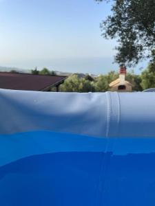 a close up of the top of a blue object at DaVi' casa vacanze. Un sogno immerso nel verde ! in Montepagano