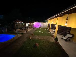 Bazén v ubytování Casa Temporada Suítes nebo v jeho okolí