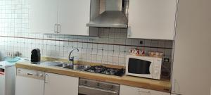 Кухня або міні-кухня у Adua Exclusive Suite